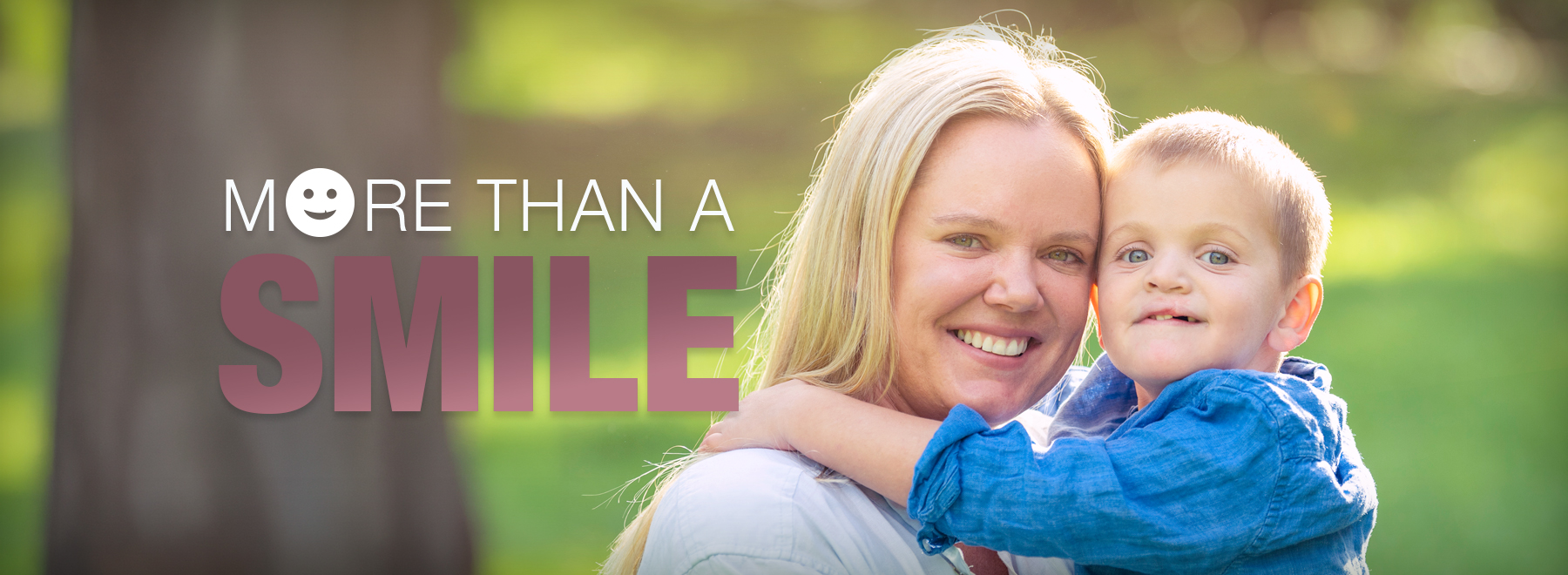 A woman and her son, who has a cleft palate, share a joyful moment, highlighted by the words "More Than a Smile."